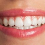 perfect smile with red lips, extreme closeup